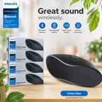 PHILIPS Bluetooth portable speaker shown in a retail promotional layout, with a stack of product boxes on the left, the speaker itself on a wooden surface on the right, and marketing text including 'Great sound wirelessly.' and 'Order Now'.