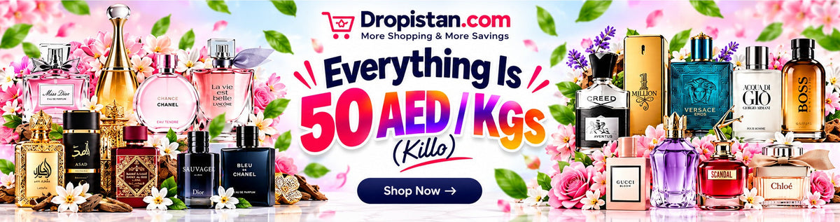 A promotional banner for Dropistan.com featuring a wide array of perfume and fragrance bottles arranged symmetrically on both sides of large text that reads 'Everything Is 50 AED/KGS (Killo)' with a 'Shop Now' button below.